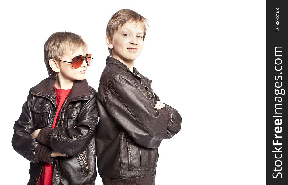 Isolated brothers posing over white background