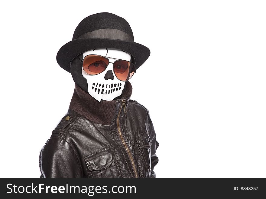 Isolated boy wearing skull mask and glasses over white background. Isolated boy wearing skull mask and glasses over white background