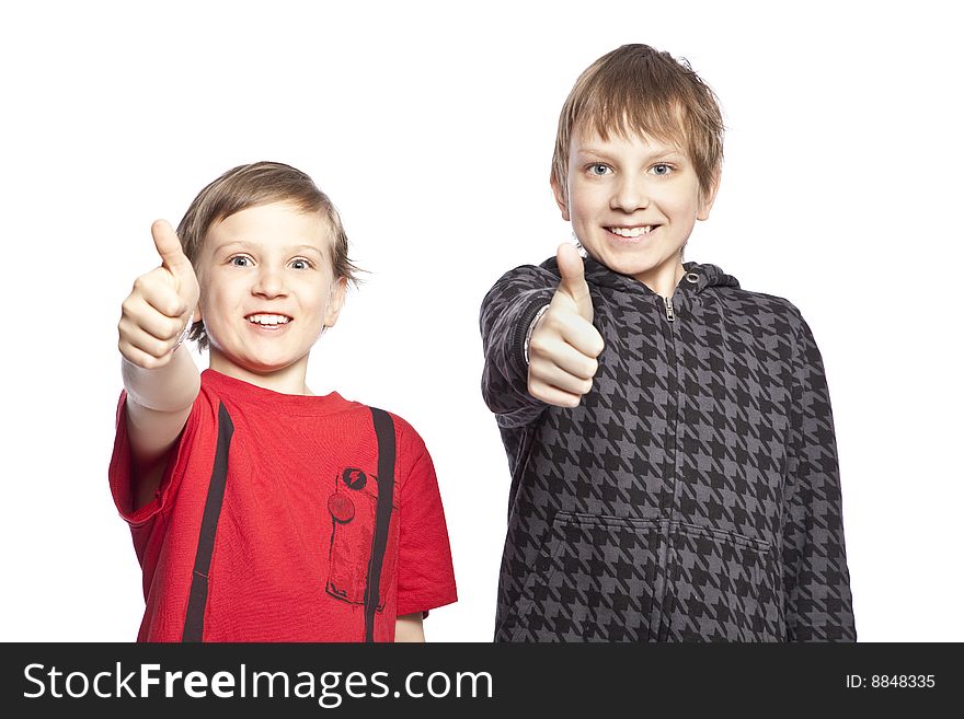 Isolated brothers posing over white background. Isolated brothers posing over white background