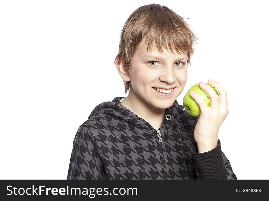 Isolated boy eating apple over white background. Isolated boy eating apple over white background