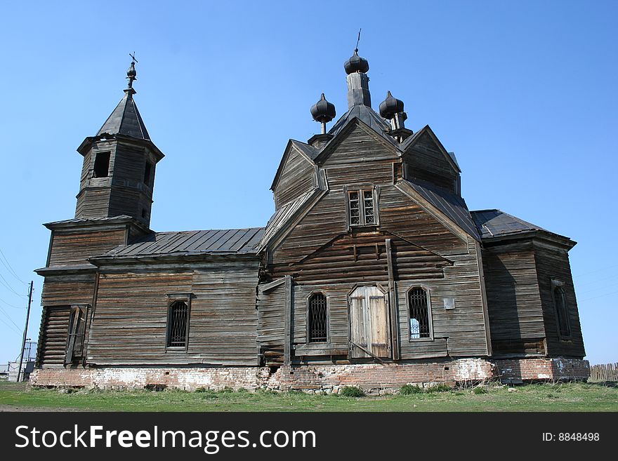 Old wooden village church during the summer. Old wooden village church during the summer