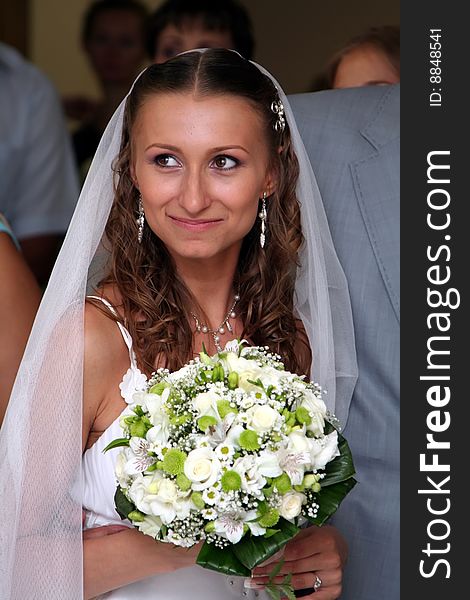 Beautiful bride with wedding bouquet