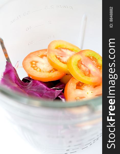 Vegetables being prepared in a blender  - making a vegetables juice