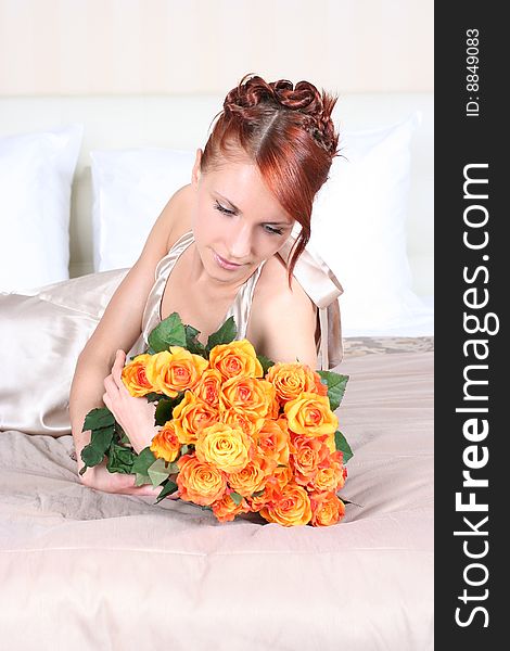 Beautiful young woman with bunch of roses. Beautiful young woman with bunch of roses
