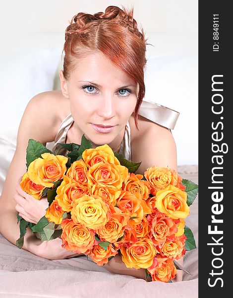 Beautiful young woman with bunch of roses. Beautiful young woman with bunch of roses