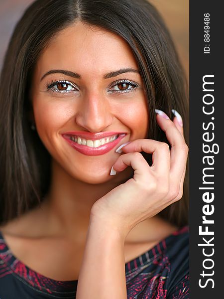 Portrait of the beautiful smiling woman with a white teeth. Portrait of the beautiful smiling woman with a white teeth