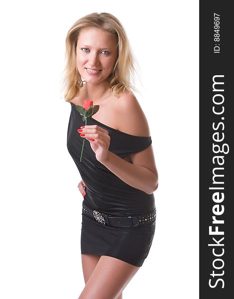 Beautiful girl in a black dress with a red rose