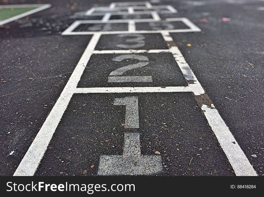 Asphalt game marked on pavement