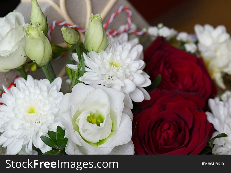 A bouquet of colorful flowers, chrysanthemums, roses and others. A bouquet of colorful flowers, chrysanthemums, roses and others.