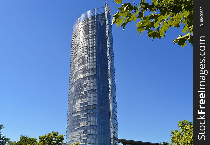 A high-rise building against the blue skies. A high-rise building against the blue skies.