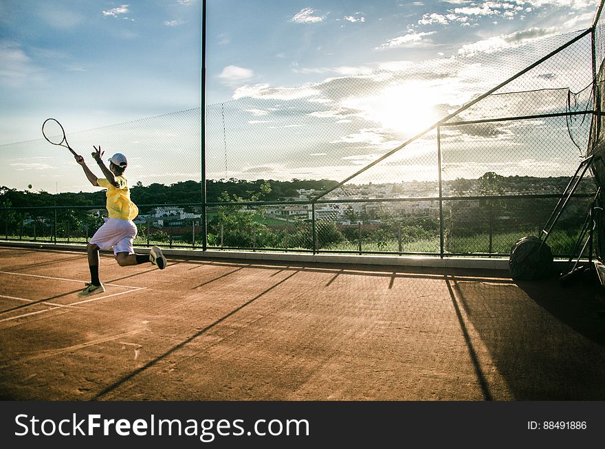 Tennis Player In Action On Court