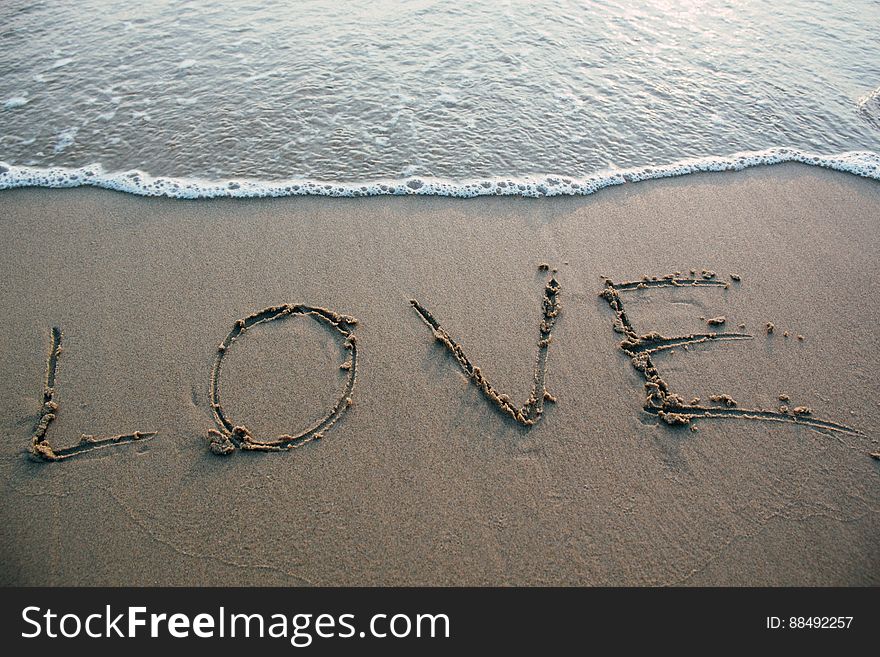 Love Sign On Sandy Beach