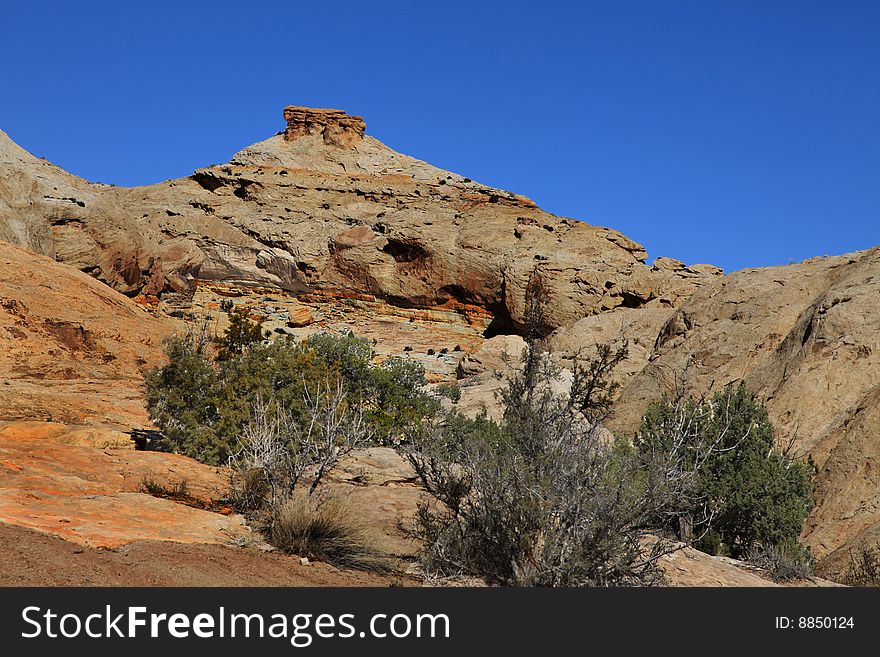 View of red rock formations in San Rafael Swell with blue sky�s