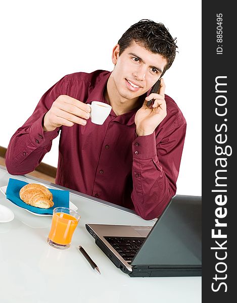 Businessman At Work With Breakfast