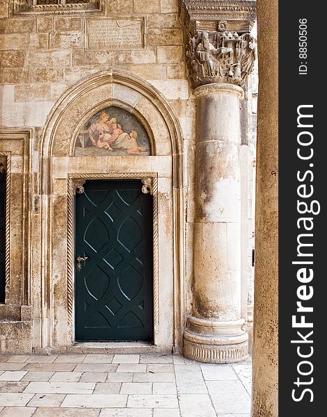 Architectural fragment - door, column, fresco. Architectural fragment - door, column, fresco