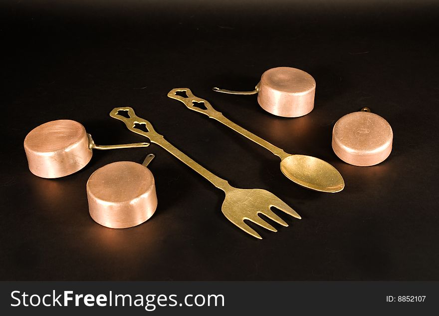 Kitchen tools on black background. Kitchen tools on black background.