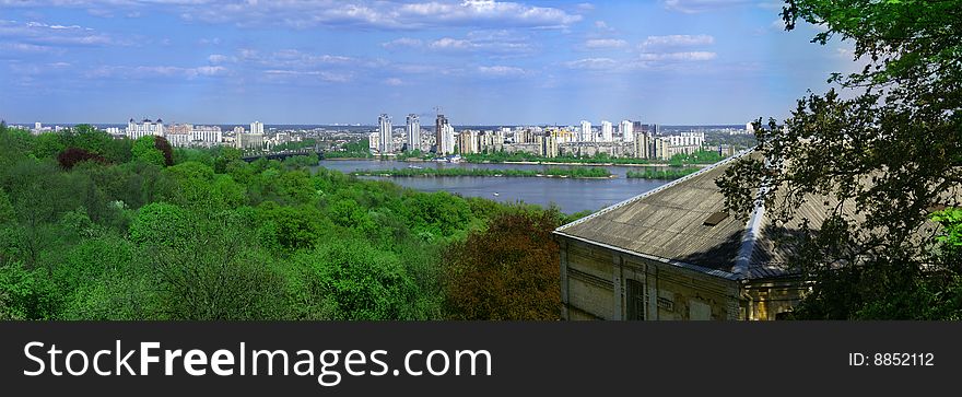 Nice horizontal panorama of the european city with river. Nice horizontal panorama of the european city with river