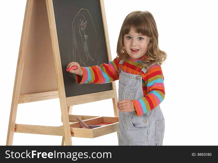 Beauty a little girl writing on a blackboard