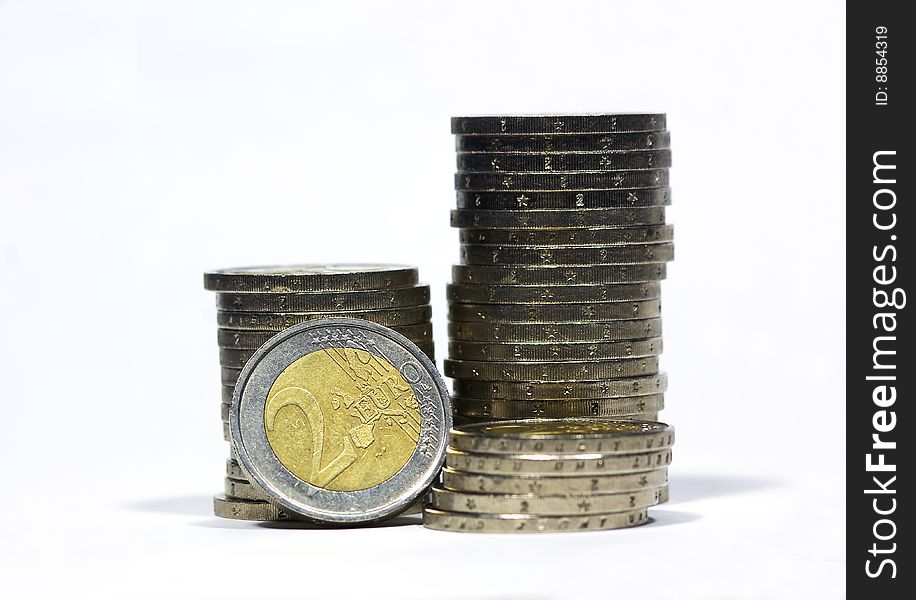 Euro coins superimposed on a white background