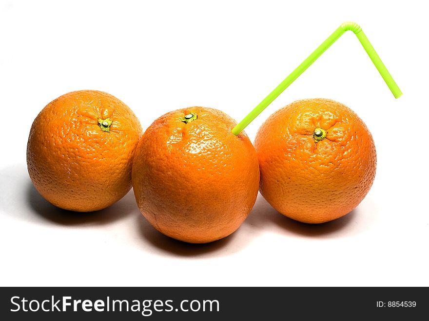 Orange with straw on a white background