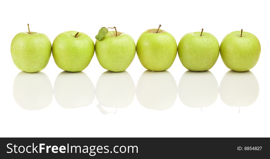 Six sweet green isolated apples. Six sweet green isolated apples