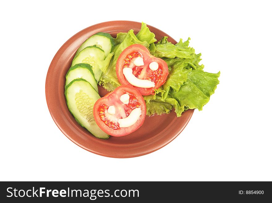 Amusing vegetable smiles on tomatoes and other vegetables