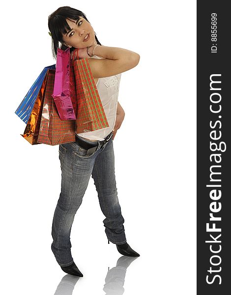 Full body view of young attractive woman going shopping with lots of colorful shopping bags. Isolated on white background. Full body view of young attractive woman going shopping with lots of colorful shopping bags. Isolated on white background.