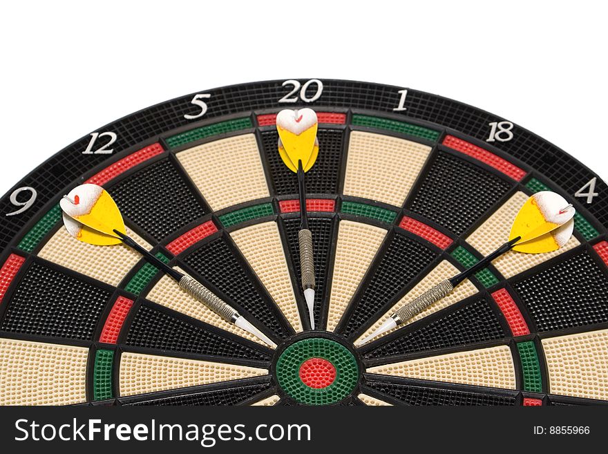 Three datrs on colored dartboard. Three datrs on colored dartboard