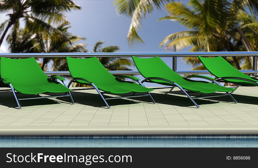 Sun chairs by the pool at fancy tropical resort