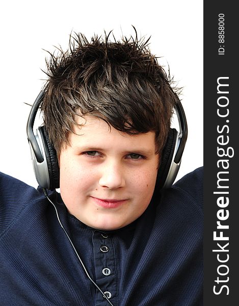 Shot of a boy with headphones on white. Shot of a boy with headphones on white