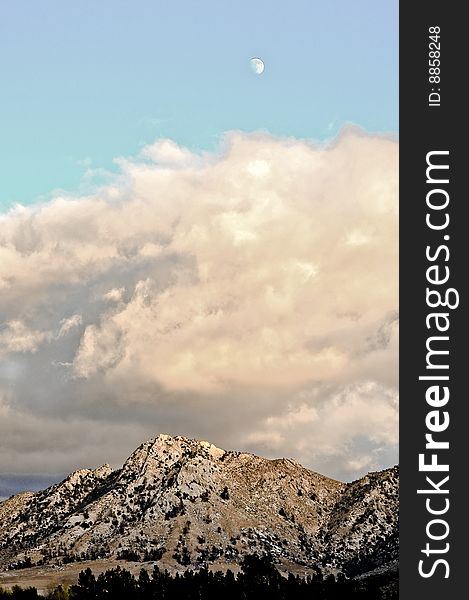 Mountain range in the Eastern Sierras with the moon. Mountain range in the Eastern Sierras with the moon