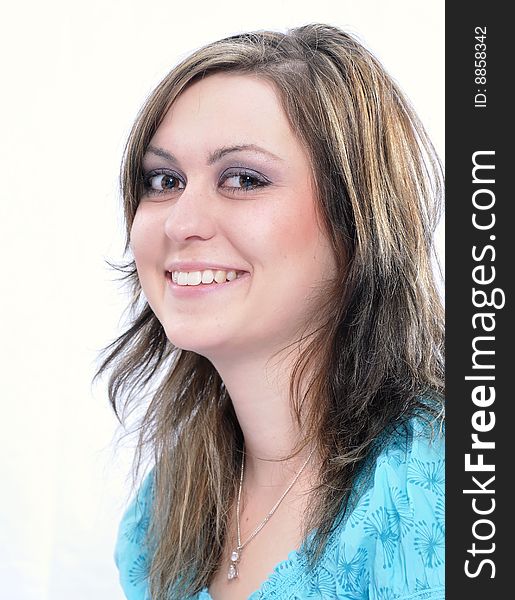 Studio Shot of a brunette woman with big brown eyes, isolated on white background. Studio Shot of a brunette woman with big brown eyes, isolated on white background