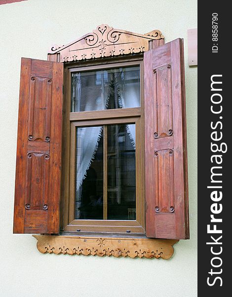 Carved wooden window in old building