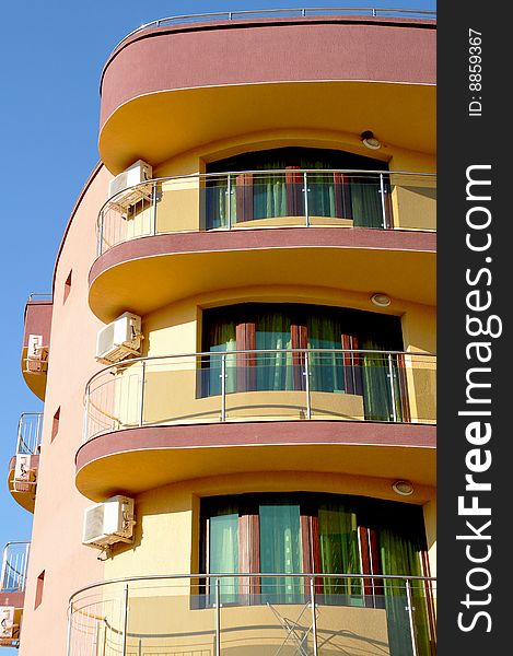 View of the colorful facade of a hotel. View of the colorful facade of a hotel