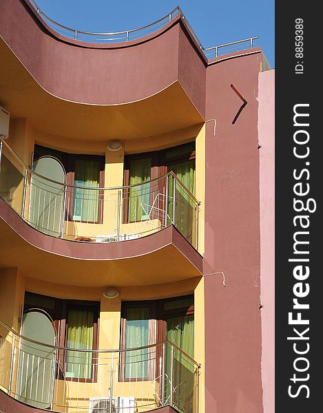 View of the colorful facade of a hotel. View of the colorful facade of a hotel