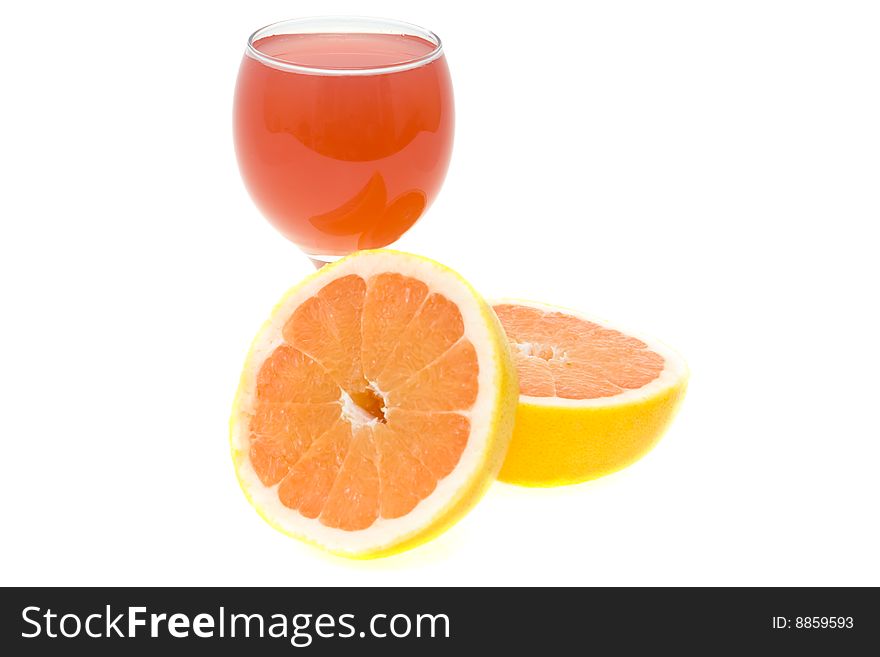 Glass of grapefruit juice with fruits isolated on white. Glass of grapefruit juice with fruits isolated on white