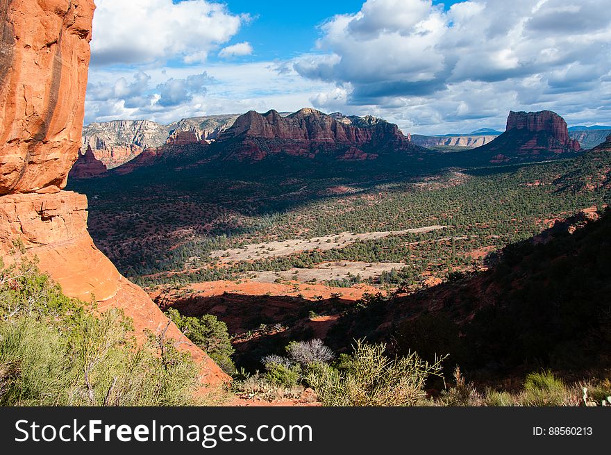 View from the saddle on Cathedral Rock. Cathedral Rock Trail ascends one of the most recognizable rock formations in the heart of Red Rock Country. Many visitors hike the first quarter mile to enjoy the fantastic views from the first ledge, where the trail meets Templeton Trail. From here, the trail becomes as much a rock climb as a hike, requiring non-technical scrambling up rock faces and ledges to make it to the final ascent to the top. The saddle between two spires offers spectacular views. The unmaintained trail explores the lava and spires at the top. Photo by Deborah Lee Soltesz, February 5, 2014. Credit: USFS Coconino National Forest. Learn more about hiking Cathedral Rock Trail No. 170 in the Red Rock Ranger District of the Coconino National Forest website.