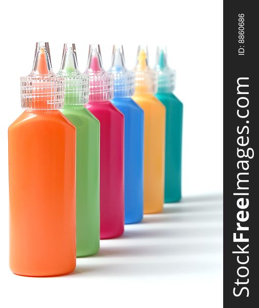 Row of color paint on a white background