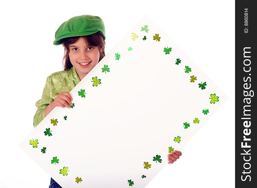 An elementary girl dressed in green holding a shamrok-bordered sign, left blank for your message.  Isolated on white. An elementary girl dressed in green holding a shamrok-bordered sign, left blank for your message.  Isolated on white.