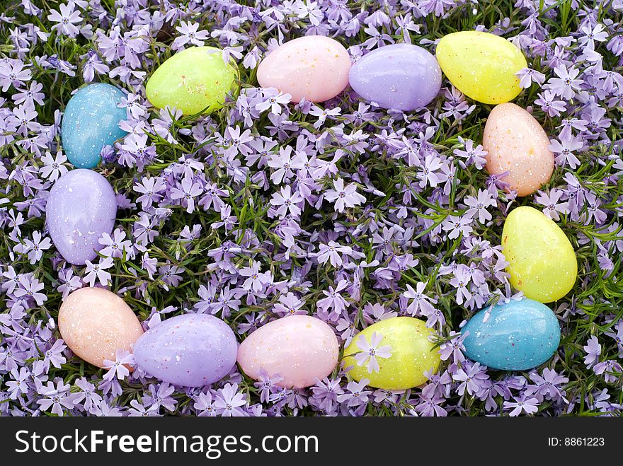 Colored Easter Eggs on a Floral Background