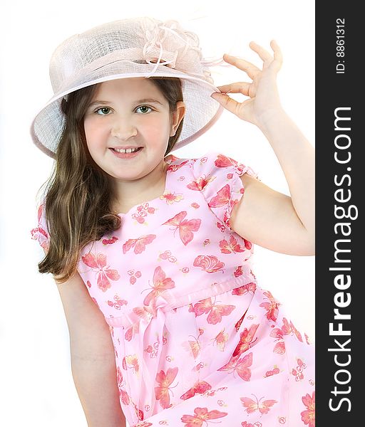 Girl on pink hat and pink dress