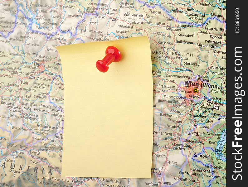 Yellow Note and red pin on map