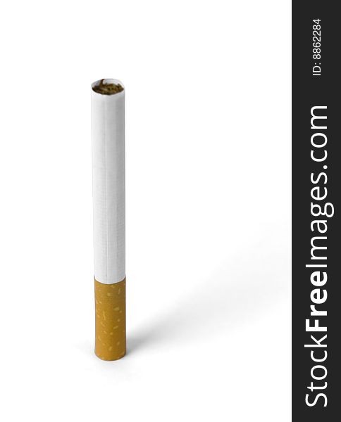 Isolated cigarette over a white colored background. Isolated cigarette over a white colored background.