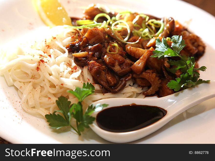 Japan noodle on a plate with soy-bean sauce