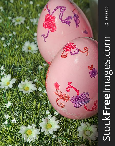 Easter pink Eggs on the green lawn. Easter pink Eggs on the green lawn
