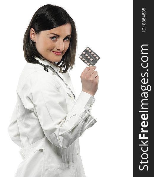 Female doctor handing medicine isolated on white