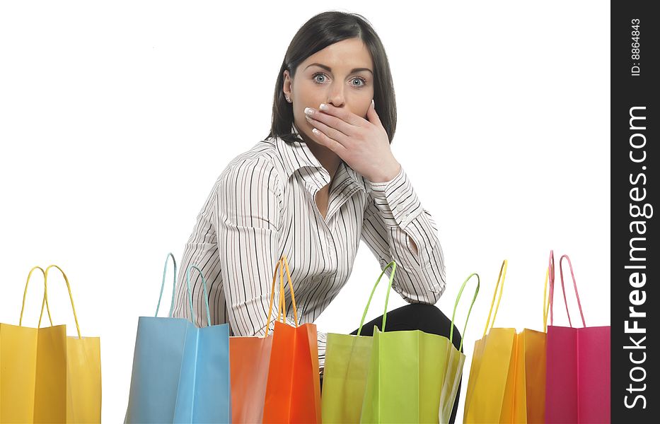 Portrait of one happy young adult girl with colored bags