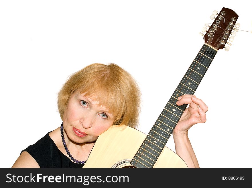 Woman with guitar is insulated on white background