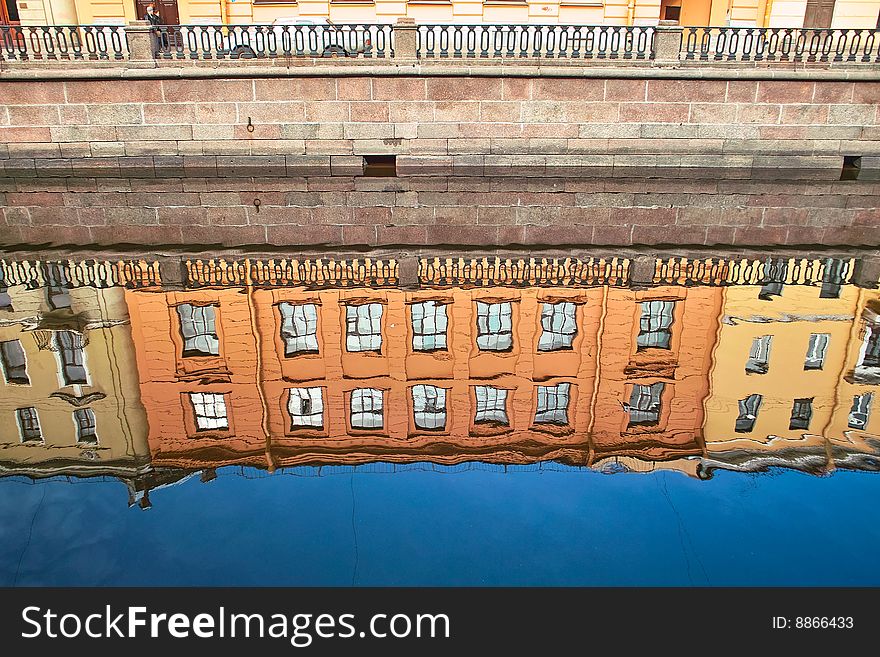 Old houses reflected in canal water, Saint Petersburg. Old houses reflected in canal water, Saint Petersburg