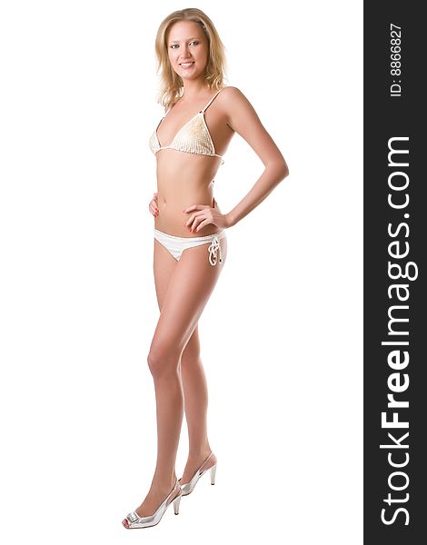 Beautiful girl in bikini isolated on a white background. Beautiful girl in bikini isolated on a white background